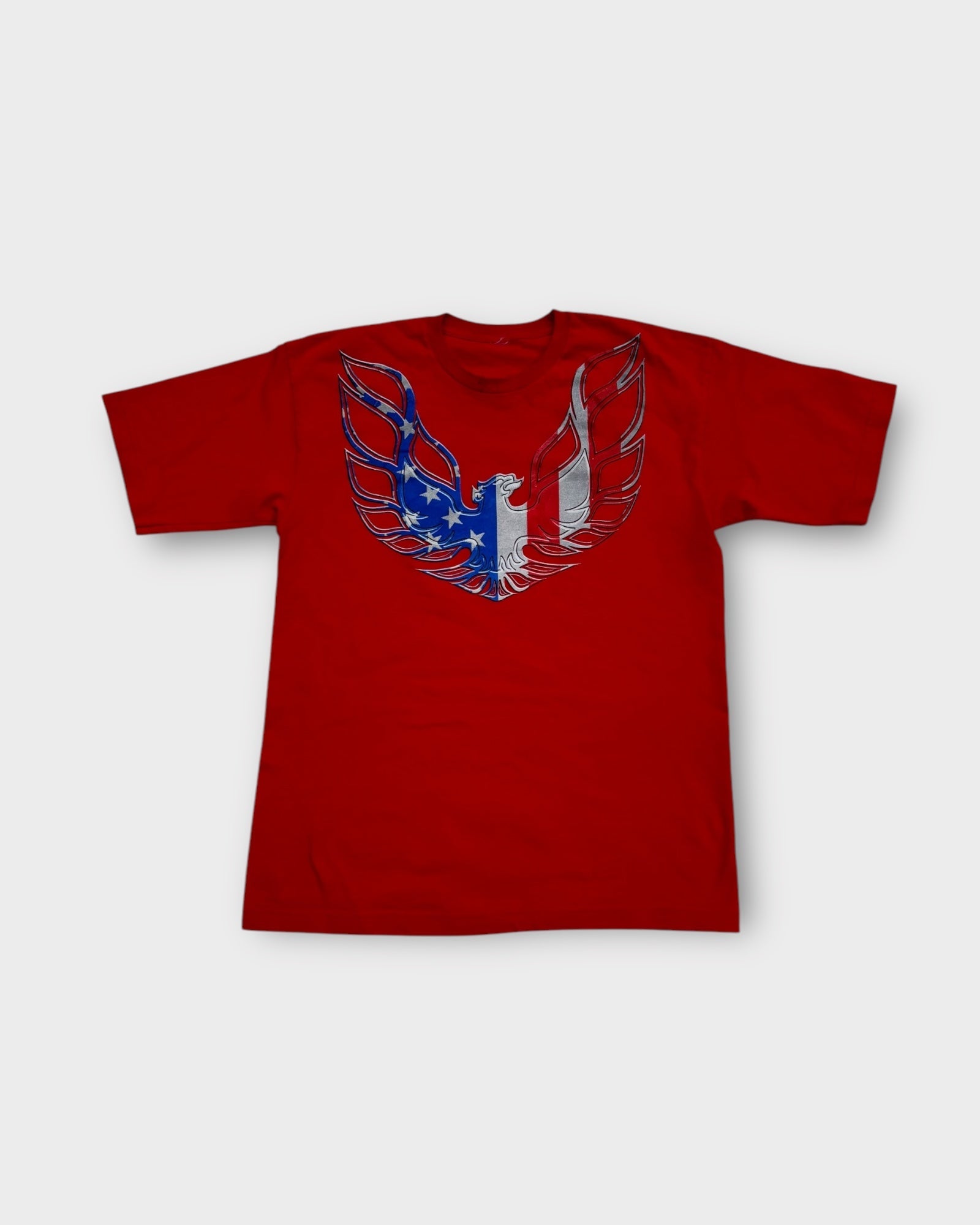 An image of a Vintage American Red Graphic Tshirt in size M.