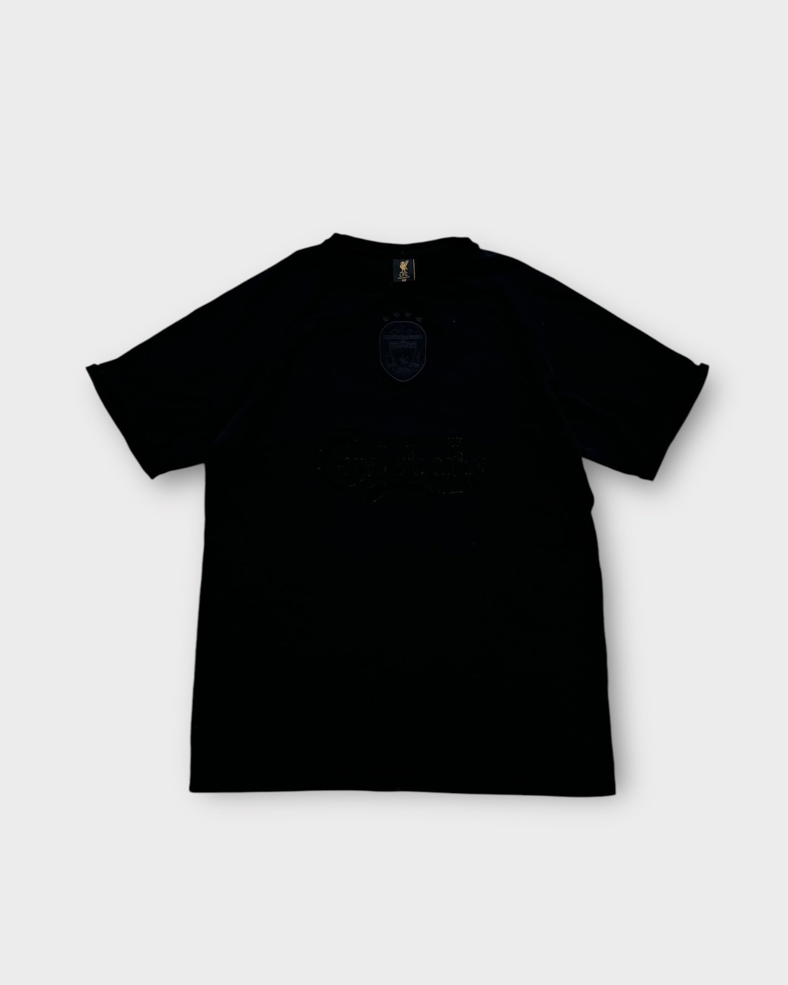 An image of a LiverpoolF.C Carlsberg Embossed Graphic Tshirt in size M.