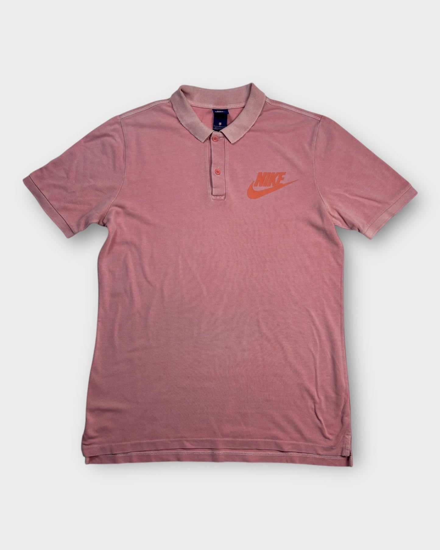 An image of a Nike Pink PoloShirt in size L.