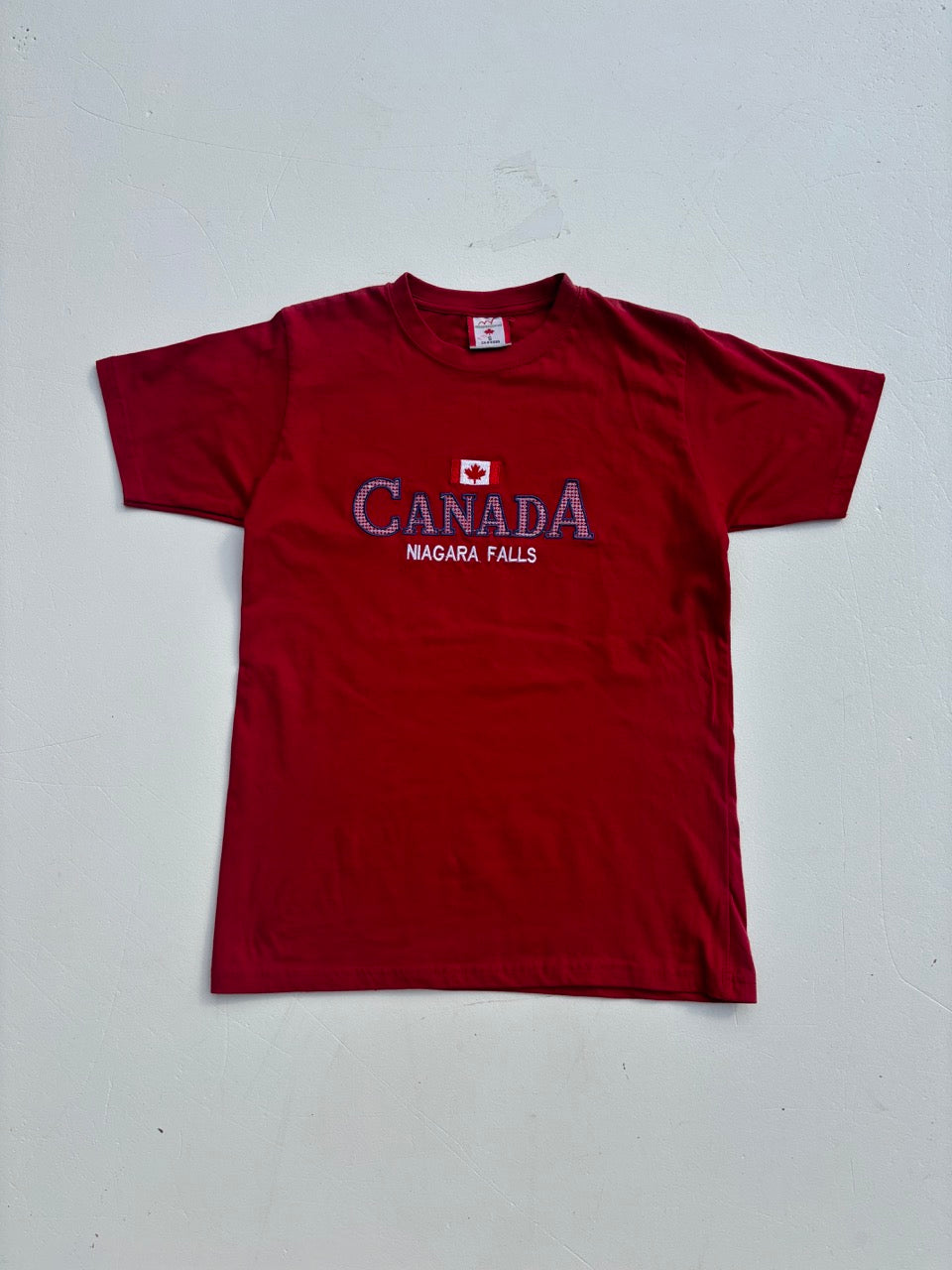 An image of a Canada Embroiderd Graphic Tshirt in size S.