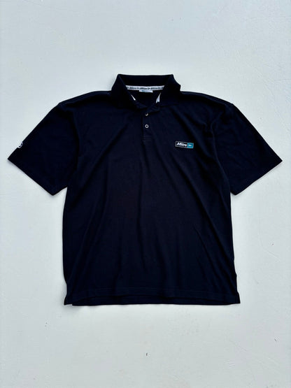 An image of a Mitre Navy Polo Shirt in size L.